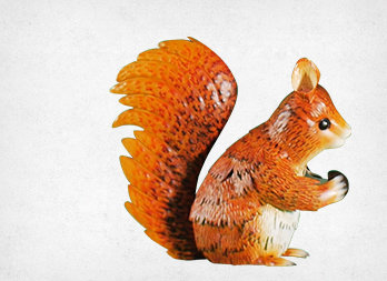 Stylized decorative squirrel figurine